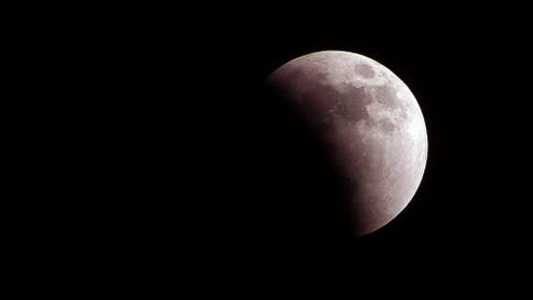 Lunar Eclipse as we saw it before the clouds came in! Image courtesy, Paul Crask.